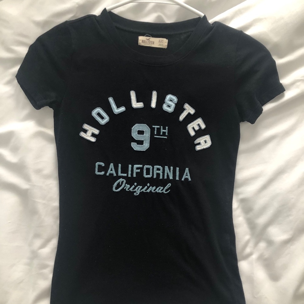 Black with blue lettering hollister shirt